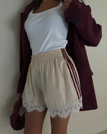 SHORTS CON BANDE LATERALI LUMINA