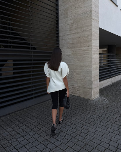 MAGLIA ASIMMETRICA CON APERTURE