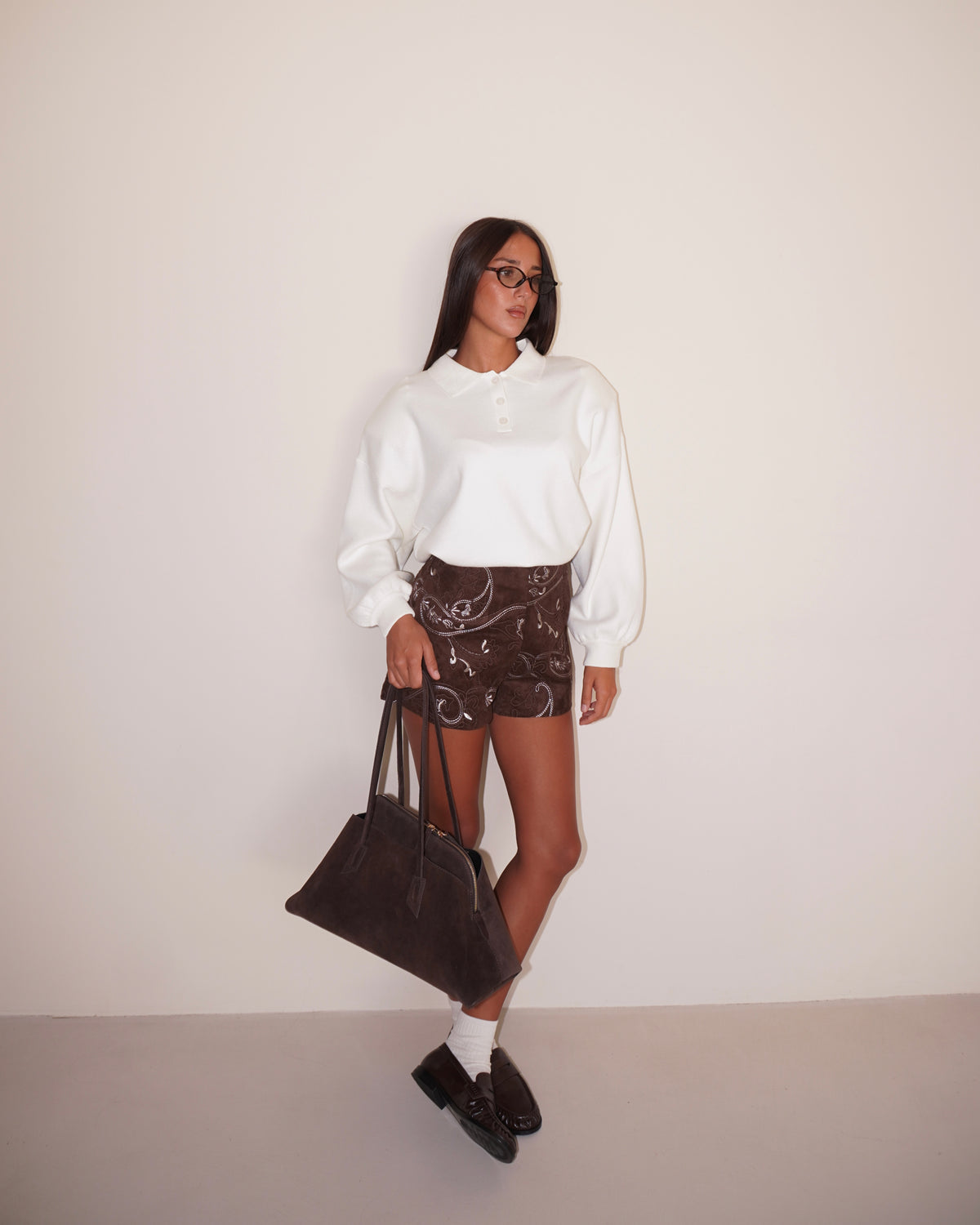 POLO CON SPALLINE IMBOTTITE