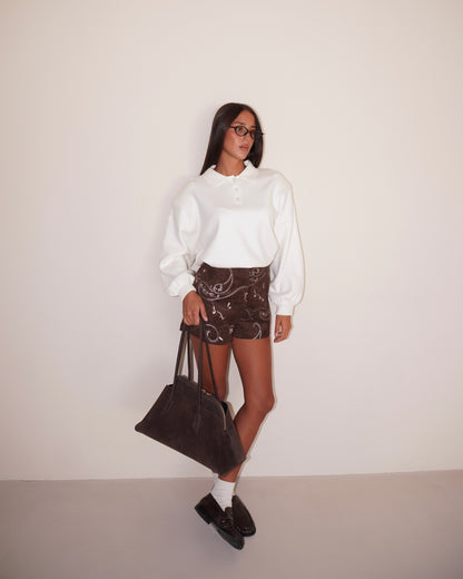 POLO CON SPALLINE IMBOTTITE