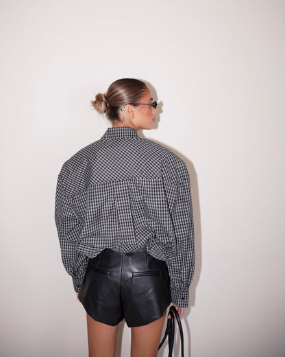CAMICIA CON SPALLINE IMBOTTITE