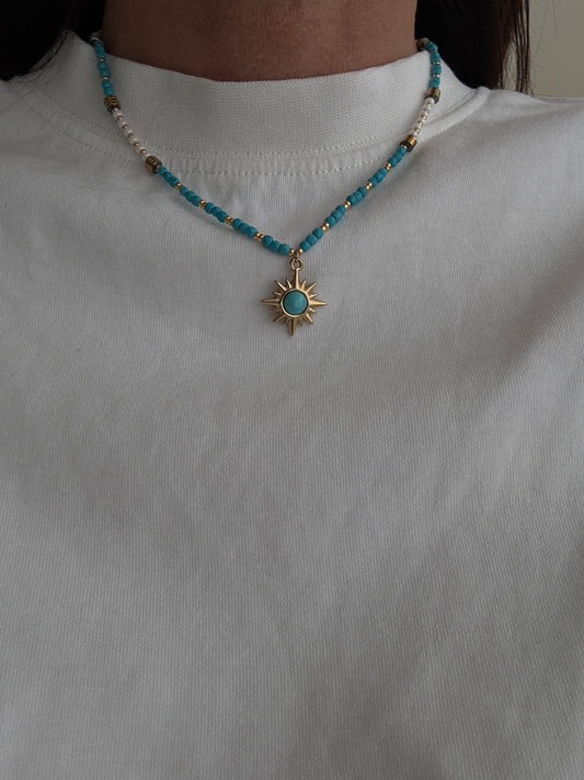 COLLANA CON PERLINE E  STELLA