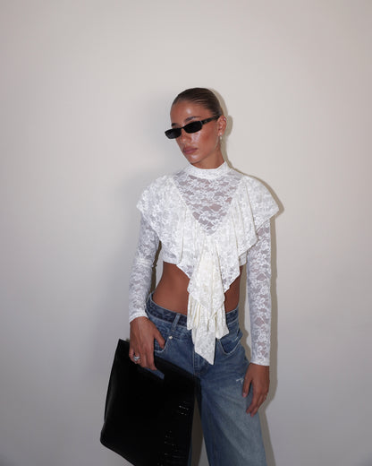 TOP IN PIZZO A MANICHE LUNGHE CON FIOCCHI