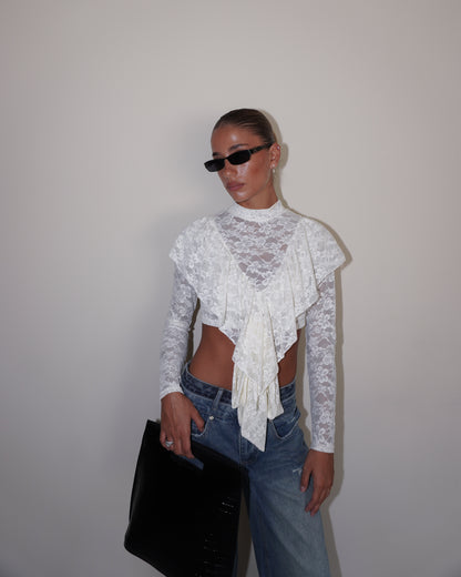 TOP IN PIZZO A MANICHE LUNGHE CON FIOCCHI