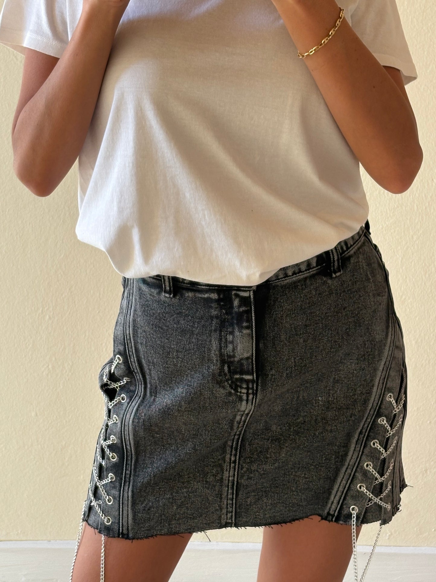 MINIGONNA IN DENIM STRINGATA