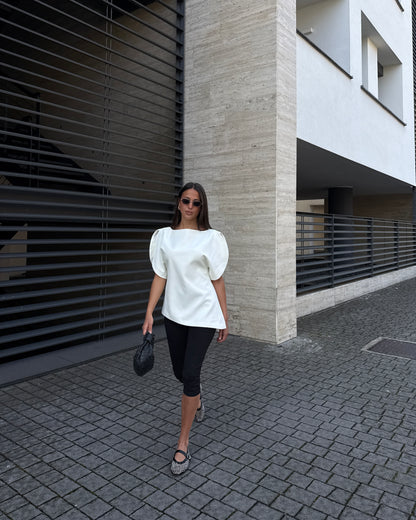 MAGLIA ASIMMETRICA CON APERTURE