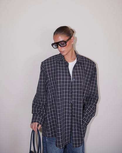 CAMICIA CON SPALLINE IMBOTTITE