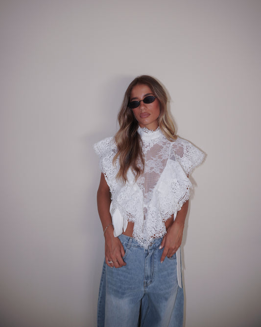 TOP IN PIZZO CON FIOCCHI LATERALI