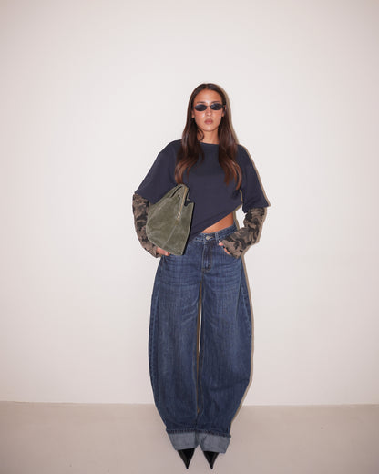 JEANS GAMBA LARGA CON RISVOLTI