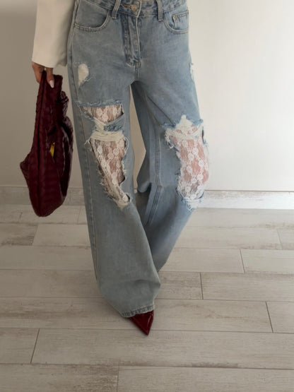 JEANS GAMBA AMPIA CON STRAPPI E PIZZO