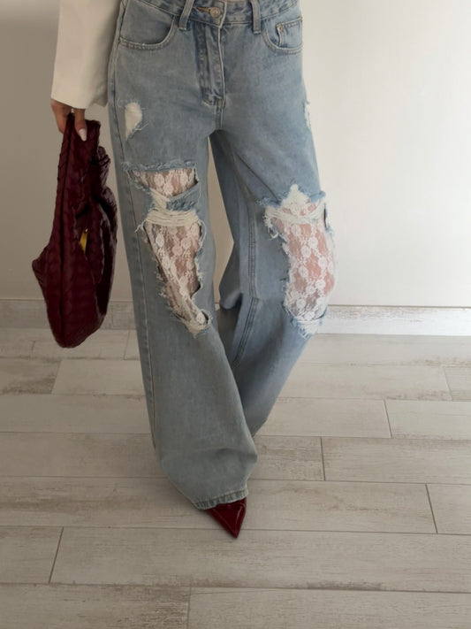 JEANS GAMBA AMPIA CON STRAPPI E PIZZO