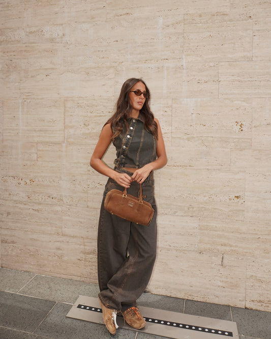 GILET CON BOTTONI E  CHIUSURA ASIMMETRICA