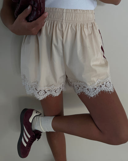 SHORTS CON BANDE LATERALI LUMINA