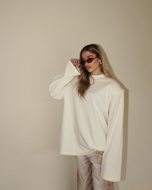 MAGLIA A MANICHE LUNGHE CON SPALLE IMBOTTITE