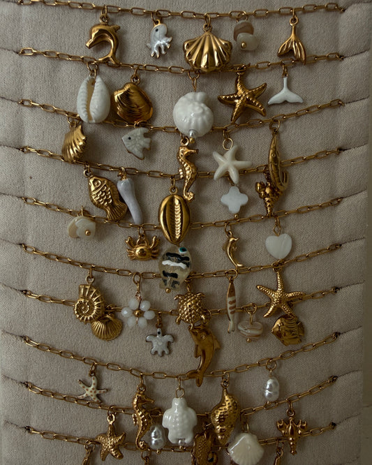 CAVIGLIERA CON CHARMS IN ACCIAO MODELLO ASSORTITO