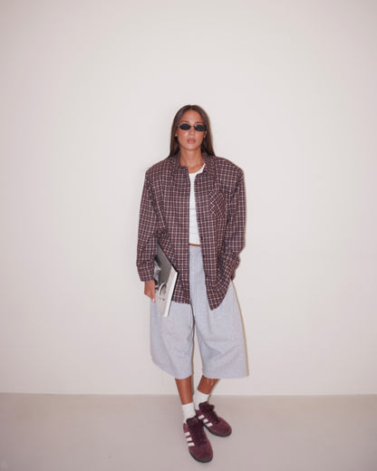 CAMICIA CON SPALLE STRUTTURATE A QUADRI
