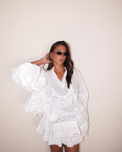 BLUSA CON PIZZO E MANICA AMPIA