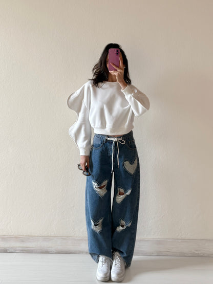 JEANS GAMBA AMPIA CON CUORICINI